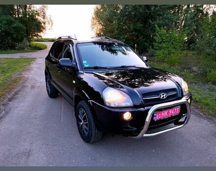 Чорний Хендай Туксон, об'ємом двигуна 2 л та пробігом 165 тис. км за 9900 $, фото 6 на Automoto.ua