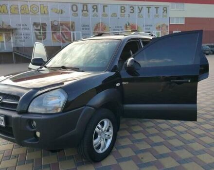 Черный Хендай Туксон, объемом двигателя 2 л и пробегом 240 тыс. км за 7900 $, фото 14 на Automoto.ua