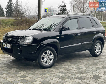 Черный Хендай Туксон, объемом двигателя 2 л и пробегом 180 тыс. км за 7700 $, фото 18 на Automoto.ua