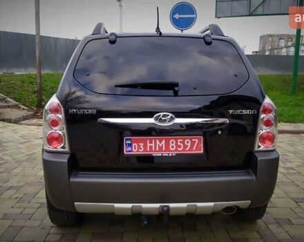 Чорний Хендай Туксон, об'ємом двигуна 2 л та пробігом 229 тис. км за 8600 $, фото 45 на Automoto.ua