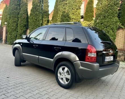 Черный Хендай Туксон, объемом двигателя 2 л и пробегом 199 тыс. км за 7777 $, фото 2 на Automoto.ua