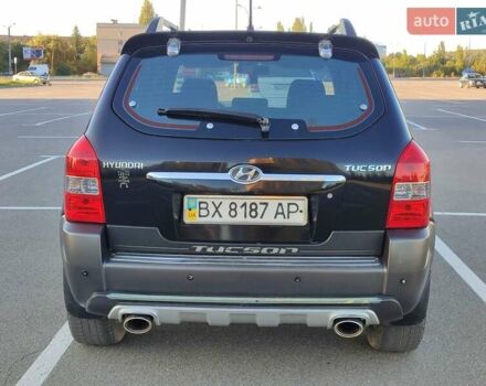 Черный Хендай Туксон, объемом двигателя 2 л и пробегом 280 тыс. км за 6700 $, фото 5 на Automoto.ua