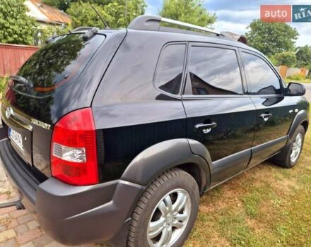Чорний Хендай Туксон, об'ємом двигуна 1.98 л та пробігом 96 тис. км за 9600 $, фото 7 на Automoto.ua