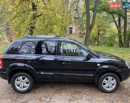 Черный Хендай Туксон, объемом двигателя 2 л и пробегом 178 тыс. км за 7860 $, фото 5 на Automoto.ua