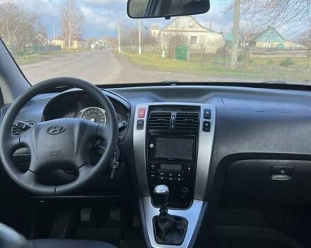 Черный Хендай Туксон, объемом двигателя 1.99 л и пробегом 302 тыс. км за 6900 $, фото 6 на Automoto.ua