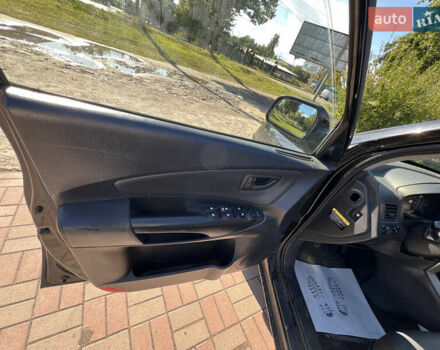 Чорний Хендай Туксон, об'ємом двигуна 2 л та пробігом 229 тис. км за 8400 $, фото 7 на Automoto.ua
