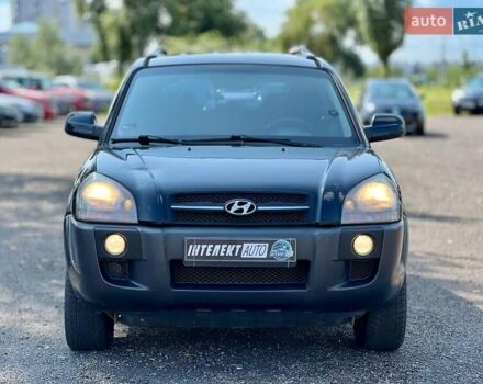 Черный Хендай Туксон, объемом двигателя 2 л и пробегом 227 тыс. км за 8200 $, фото 1 на Automoto.ua