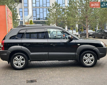 Черный Хендай Туксон, объемом двигателя 2 л и пробегом 327 тыс. км за 7850 $, фото 9 на Automoto.ua
