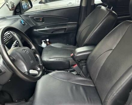 Черный Хендай Туксон, объемом двигателя 1.98 л и пробегом 147 тыс. км за 8000 $, фото 21 на Automoto.ua