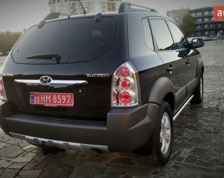 Черный Хендай Туксон, объемом двигателя 2 л и пробегом 230 тыс. км за 8600 $, фото 18 на Automoto.ua