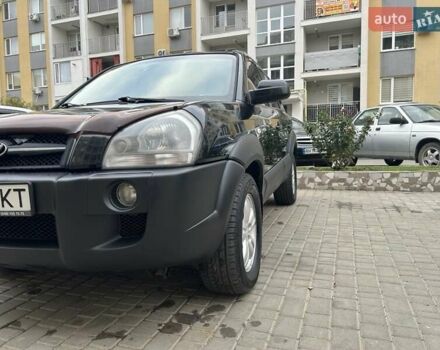 Черный Хендай Туксон, объемом двигателя 1.98 л и пробегом 147 тыс. км за 8000 $, фото 9 на Automoto.ua