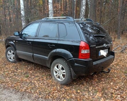 Черный Хендай Туксон, объемом двигателя 2 л и пробегом 240 тыс. км за 8800 $, фото 3 на Automoto.ua