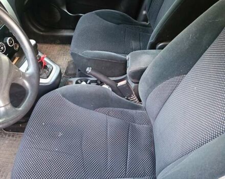 Чорний Хендай Туксон, об'ємом двигуна 2 л та пробігом 204 тис. км за 8000 $, фото 5 на Automoto.ua