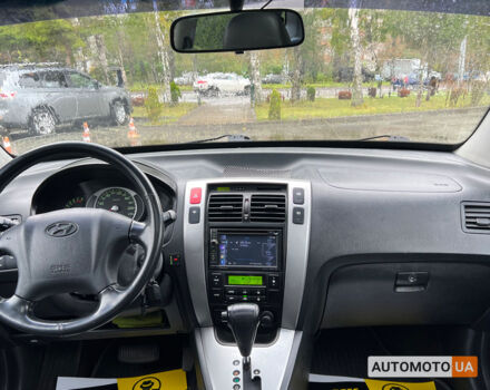 Черный Хендай Туксон, объемом двигателя 2 л и пробегом 201 тыс. км за 8600 $, фото 10 на Automoto.ua