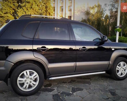 Черный Хендай Туксон, объемом двигателя 2 л и пробегом 230 тыс. км за 8600 $, фото 37 на Automoto.ua