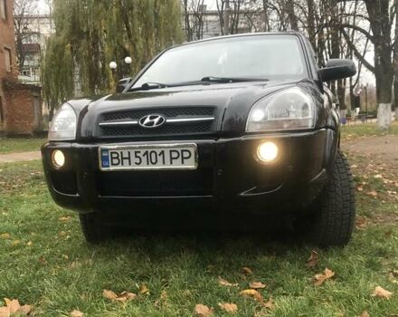 Черный Хендай Туксон, объемом двигателя 2 л и пробегом 210 тыс. км за 8999 $, фото 9 на Automoto.ua