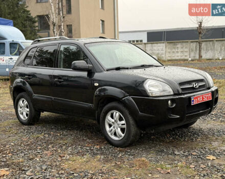 Чорний Хендай Туксон, об'ємом двигуна 2 л та пробігом 196 тис. км за 7250 $, фото 6 на Automoto.ua