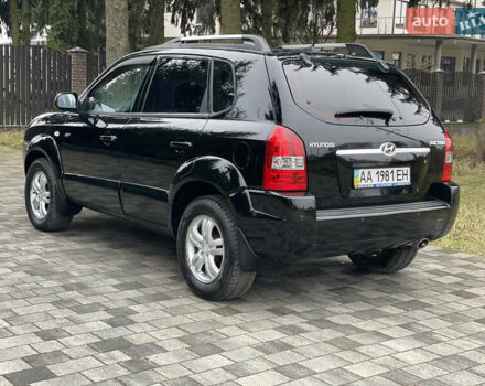 Черный Хендай Туксон, объемом двигателя 2 л и пробегом 180 тыс. км за 7700 $, фото 16 на Automoto.ua
