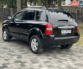 Черный Хендай Туксон, объемом двигателя 2 л и пробегом 180 тыс. км за 7700 $, фото 16 на Automoto.ua