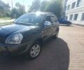 Черный Хендай Туксон, объемом двигателя 2 л и пробегом 203 тыс. км за 7600 $, фото 1 на Automoto.ua