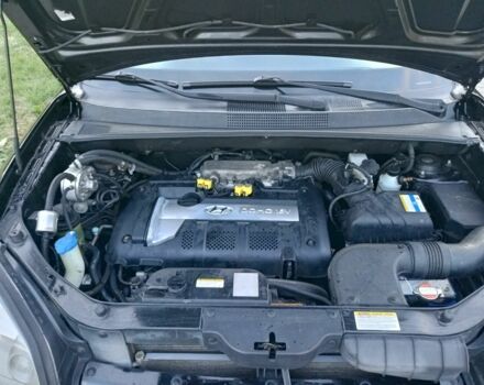 Черный Хендай Туксон, объемом двигателя 2 л и пробегом 192 тыс. км за 7950 $, фото 19 на Automoto.ua