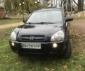 Черный Хендай Туксон, объемом двигателя 2 л и пробегом 210 тыс. км за 8999 $, фото 4 на Automoto.ua
