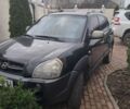 Чорний Хендай Туксон, об'ємом двигуна 2 л та пробігом 400 тис. км за 7000 $, фото 1 на Automoto.ua