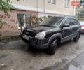 Черный Хендай Туксон, объемом двигателя 1.98 л и пробегом 234 тыс. км за 7800 $, фото 1 на Automoto.ua