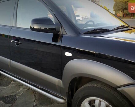 Черный Хендай Туксон, объемом двигателя 2 л и пробегом 230 тыс. км за 8600 $, фото 54 на Automoto.ua