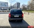 Чорний Хендай Туксон, об'ємом двигуна 2 л та пробігом 350 тис. км за 7500 $, фото 6 на Automoto.ua
