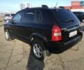 Черный Хендай Туксон, объемом двигателя 2 л и пробегом 180 тыс. км за 9200 $, фото 1 на Automoto.ua