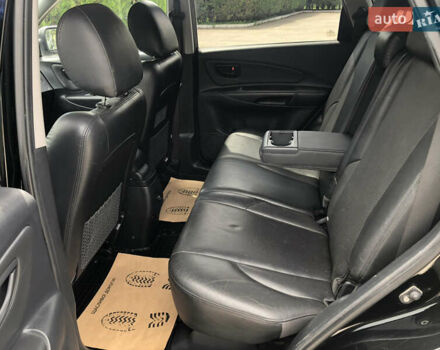 Чорний Хендай Туксон, об'ємом двигуна 2 л та пробігом 141 тис. км за 8200 $, фото 14 на Automoto.ua