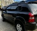 Чорний Хендай Туксон, об'ємом двигуна 2 л та пробігом 240 тис. км за 8600 $, фото 3 на Automoto.ua