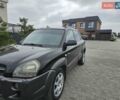 Черный Хендай Туксон, объемом двигателя 2 л и пробегом 272 тыс. км за 7400 $, фото 1 на Automoto.ua
