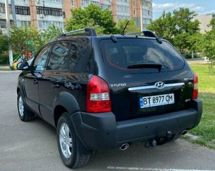 Черный Хендай Туксон, объемом двигателя 2.7 л и пробегом 180 тыс. км за 7900 $, фото 4 на Automoto.ua