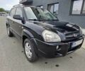 Черный Хендай Туксон, объемом двигателя 2 л и пробегом 180 тыс. км за 3000 $, фото 1 на Automoto.ua
