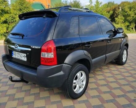 Черный Хендай Туксон, объемом двигателя 2 л и пробегом 240 тыс. км за 7900 $, фото 4 на Automoto.ua