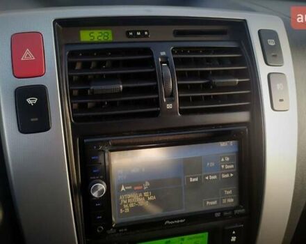 Черный Хендай Туксон, объемом двигателя 2 л и пробегом 230 тыс. км за 8600 $, фото 168 на Automoto.ua