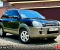 Черный Хендай Туксон, объемом двигателя 2 л и пробегом 212 тыс. км за 9000 $, фото 1 на Automoto.ua