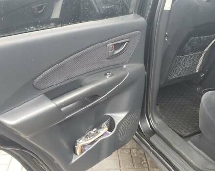Чорний Хендай Туксон, об'ємом двигуна 1.98 л та пробігом 172 тис. км за 9300 $, фото 5 на Automoto.ua