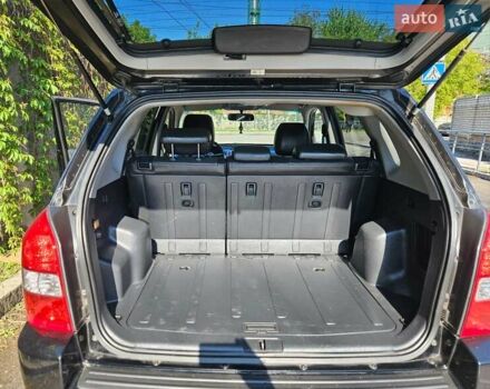 Чорний Хендай Туксон, об'ємом двигуна 2 л та пробігом 152 тис. км за 7950 $, фото 9 на Automoto.ua