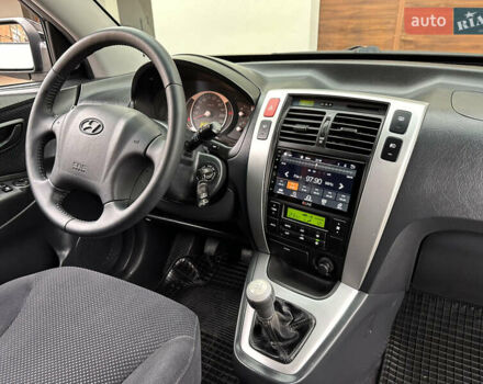 Хендай Туксон 2007 в Ужгороде на Automoto.ua Черный Хендай Туксон, объемом двигателя 1.98 л и пробегом 157 тыс. км за 7300 $, фото 30 на Automoto.ua