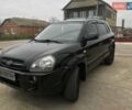 Черный Хендай Туксон, объемом двигателя 2 л и пробегом 210 тыс. км за 8999 $, фото 33 на Automoto.ua