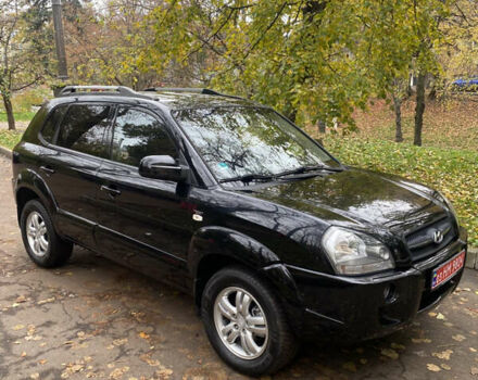 Черный Хендай Туксон, объемом двигателя 2 л и пробегом 178 тыс. км за 7860 $, фото 3 на Automoto.ua