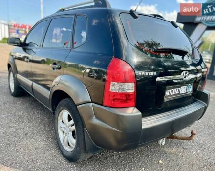 Черный Хендай Туксон, объемом двигателя 2 л и пробегом 227 тыс. км за 8200 $, фото 29 на Automoto.ua