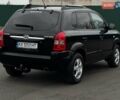 Черный Хендай Туксон, объемом двигателя 1.98 л и пробегом 260 тыс. км за 6900 $, фото 4 на Automoto.ua