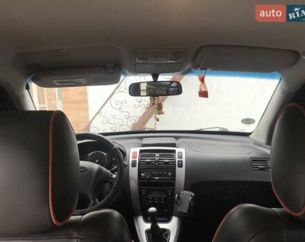 Черный Хендай Туксон, объемом двигателя 2 л и пробегом 210 тыс. км за 8999 $, фото 44 на Automoto.ua
