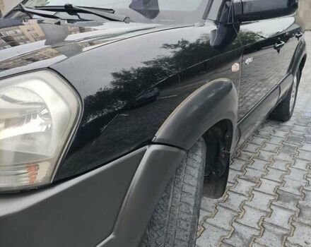 Черный Хендай Туксон, объемом двигателя 2.7 л и пробегом 280 тыс. км за 7200 $, фото 21 на Automoto.ua