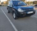 Черный Хендай Туксон, объемом двигателя 2 л и пробегом 289 тыс. км за 6600 $, фото 1 на Automoto.ua