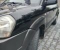 Черный Хендай Туксон, объемом двигателя 2.7 л и пробегом 280 тыс. км за 7200 $, фото 21 на Automoto.ua